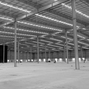 Factory construction progress — completed shell